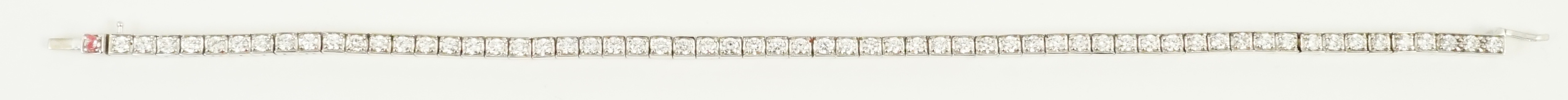 A late 20th century Cartier 18ct white gold and diamond set line bracelet